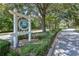 Entrance to Victoria Trails, featuring a lush green landscape and welcoming community sign at 410 E Victoria Trails Blvd, Deland, FL 32724