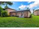 Charming brick apartment featuring a well-manicured lawn and inviting entrance at 416 Banyon Tree Cir # 108, Maitland, FL 32751