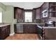 Modern kitchen features stainless steel appliances, granite countertops, and stylish mosaic backsplash at 416 Banyon Tree Cir # 108, Maitland, FL 32751