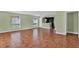 Open living area with ceramic floors, neutral walls, and view into the kitchen at 416 Banyon Tree Cir # 108, Maitland, FL 32751