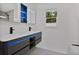 Stylish bathroom features a modern vanity with double sinks and under-cabinet lighting at 4201 Mizell St, Orlando, FL 32812