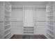 Spacious walk-in closet with custom built-in shelving and ample storage at 4201 Mizell St, Orlando, FL 32812
