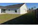 Backyard view of the new home with a wood fence at 468 Marion Oaks Blvd, Ocala, FL 34473