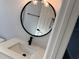 Close-up of renovated bathroom vanity with quartz countertop and matte black faucet at 468 Marion Oaks Blvd, Ocala, FL 34473