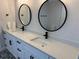 Spacious bathroom featuring double sinks, ample counter space, and modern fixtures at 468 Marion Oaks Blvd, Ocala, FL 34473