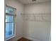 Unfurnished closet featuring white walls, trim, and wire rack, and a window at 468 Marion Oaks Blvd, Ocala, FL 34473