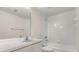 Bathroom with tile shower and vanity at 527 Villa Del Sol Cir # 104, Orlando, FL 32824