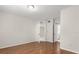 Bright bedroom featuring a neutral color palette and hardwood floors at 527 Villa Del Sol Cir # 104, Orlando, FL 32824