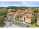 An exterior elevation shows the property's parking, landscaping, and architectural details at 527 Villa Del Sol Cir # 104, Orlando, FL 32824