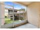 Enclosed patio with view of backyard at 527 Villa Del Sol Cir # 104, Orlando, FL 32824