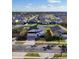 A beautiful aerial view of a well-manicured home in a suburban neighborhood at 558 Cadiz Loop, Davenport, FL 33837