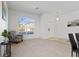 Bright and spacious living room with large window offering plenty of natural light at 558 Cadiz Loop, Davenport, FL 33837