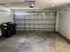 View of the garage with a white garage door at 5918 Stratton Ln, Orlando, FL 32808