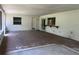Spacious screened patio with multiple doors to the interior at 5918 Stratton Ln, Orlando, FL 32808