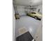 Spacious garage featuring epoxy floor, an overhead door and a vintage car at 6129 Citrus Grove Ct, St Cloud, FL 34771