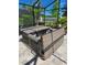 Outdoor hot tub in screened patio at 6129 Citrus Grove Ct, St Cloud, FL 34771