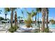 Relaxing poolside hammocks and swaying palm trees create a tropical oasis at 6129 Citrus Grove Ct, St Cloud, FL 34771