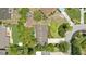 Aerial view of home featuring lush landscaping and a well-maintained yard at 619 Byron Rd, Winter Park, FL 32792
