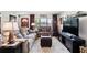 Comfortable living room with large windows, cozy seating, and a neutral color scheme, creating a welcoming atmosphere at 619 Byron Rd, Winter Park, FL 32792