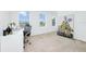 Bright bedroom with a workspace and large window, filled with natural light at 652 Benoi Dr, Davenport, FL 33896