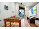 Spacious game room with foosball table, shuffleboard table, and views of the outdoors at 652 Benoi Dr, Davenport, FL 33896