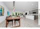 Open floor plan combining living, dining, and kitchen areas with lots of light at 652 Benoi Dr, Davenport, FL 33896