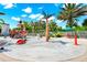 Fun splash pad area with water features, a pirate ship, and seating area at 652 Benoi Dr, Davenport, FL 33896