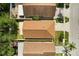 An aerial view shows the rooftops of several homes, neatly arranged in a suburban neighborhood setting at 6819 Belmar Dr, Orlando, FL 32807