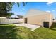 View of the back exterior with fenced yard and patio at 6819 Belmar Dr, Orlando, FL 32807