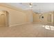 Spacious living room showcasing tile floors, neutral walls, and an open layout at 6819 Belmar Dr, Orlando, FL 32807
