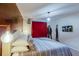 Comfortable bedroom featuring modern design with a stylish bed and warm lighting at 7352 Oakmoss Loop, Davenport, FL 33837