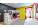 Charming bedroom featuring a bunk bed and lively decor, ideal for  at 7352 Oakmoss Loop, Davenport, FL 33837