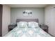 Bedroom showcasing stylish décor, a plush bed, and gray walls at 7352 Oakmoss Loop, Davenport, FL 33837
