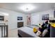 Cozy bedroom with a themed bed, modern decor, and a view of the en suite bathroom at 7352 Oakmoss Loop, Davenport, FL 33837