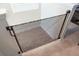 View of a landing with a retractable mesh safety gate at 7352 Oakmoss Loop, Davenport, FL 33837