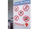 The community pool rules are displayed on a sign next to the BBQ grill at 7352 Oakmoss Loop, Davenport, FL 33837