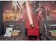 Close-up of a Star Wars bedroom with two beds, decorative mural and a red bedside table at 7577 Oak Spring Ln, Davenport, FL 33837