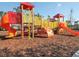 Bright and colorful playground with slides and climbing structures, ideal for play at 7577 Oak Spring Ln, Davenport, FL 33837