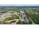 Beautiful aerial view of a suburban neighborhood with tree-lined streets and well-maintained homes at 805 Gordonia Ct, Deland, FL 32724
