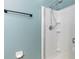 Bathroom featuring a shower with a glass door and a towel rack at 805 Gordonia Ct, Deland, FL 32724