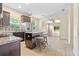 A kitchen with granite countertops, stainless steel appliances, and ample cabinet space at 805 Gordonia Ct, Deland, FL 32724