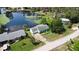 Aerial view of a single-story home with an attached garage located on a freshwater canal at 8121 Via Bonita, Sanford, FL 32771