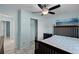 Comfortable bedroom featuring a ceiling fan and a closet for ample storage space at 8121 Via Bonita, Sanford, FL 32771