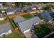 Bird's eye view of a well-maintained property with a grey roof and a green, fenced backyard at 838 Haulover Dr, Altamonte Springs, FL 32714
