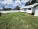 Spacious backyard with a white privacy fence, offering a serene outdoor space at 838 Haulover Dr, Altamonte Springs, FL 32714
