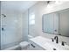 Bathroom featuring modern fixtures, white vanity, and a tiled walk-in shower at 838 Haulover Dr, Altamonte Springs, FL 32714