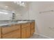 Bathroom vanity with granite countertop with updated faucet and sink at 106 Turtle Run, Umatilla, FL 32784