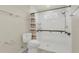 Bathroom showcasing a walk-in shower with tile surround and safety bar at 106 Turtle Run, Umatilla, FL 32784