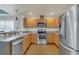 Well-equipped kitchen with stainless steel appliances, ample cabinet space, and granite countertops perfect for any home chef at 106 Turtle Run, Umatilla, FL 32784