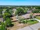 A sunny day shows the aerial view of the beautiful, fenced lot and neighborhood at 1233 Gladstone Dr, Deltona, FL 32725